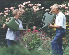 Nancy & Andrew watering cans by Graham McGirk